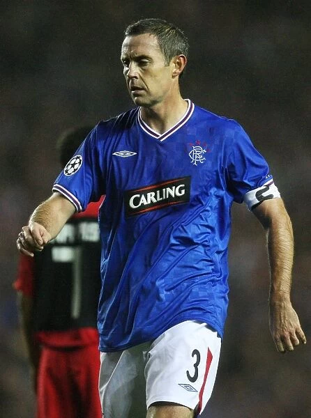 Heartbreaking Moment: Rangers David Weir Faces Defeat Against Sevilla in Champions League Group G at Ibrox Stadium (1-4)