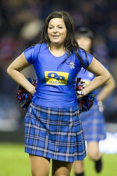 Hibernian Triumphs Over Rangers: 0-3 in the Scottish Premier League - Cheerleaders Perspective at Ibrox Stadium
