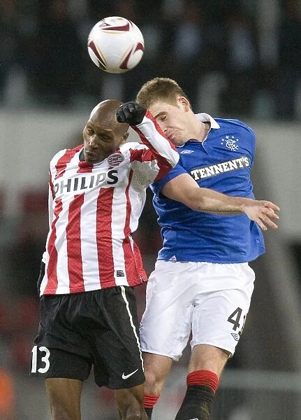 Hutchinson vs. Hutton: A 0-0 Battle at Philips Stadion - PSV Eindhoven vs. Rangers, UEFA Europa League Round of 16