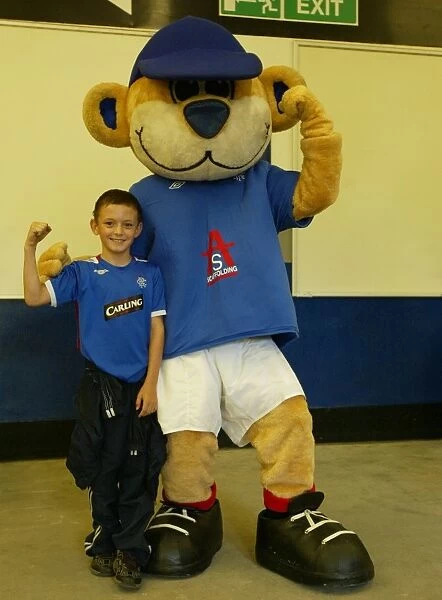 Ibrox Roars Pride: Rangers Triumphant 2-1 Victory Over Kilmarnock with Broxi and Ecstatic Fans