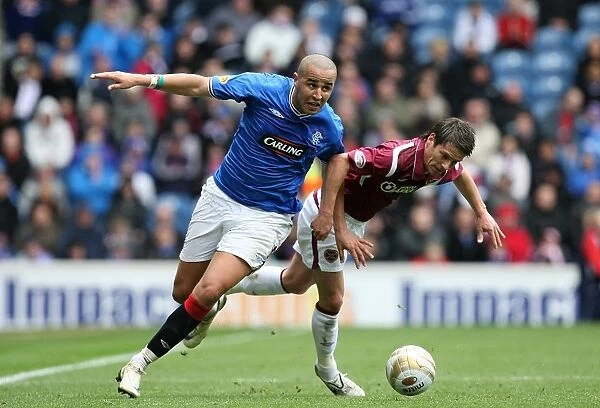 Intense Battle for Supremacy: Bougherra vs Black at Ibrox - Rangers 2-0 Victory over Hearts