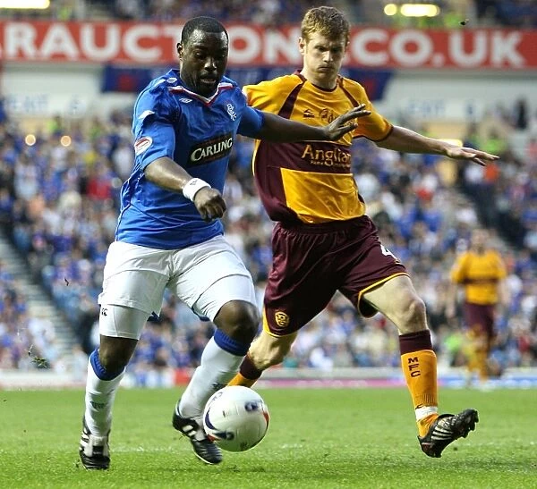 Intense Battle for Supremacy: Darcheville vs Reynolds at Ibrox - Rangers 1-0 Motherwell