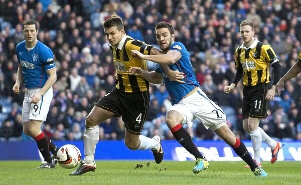 Intense Battle for Supremacy: Rangers vs East Fife in Scottish League One at Ibrox Stadium (2003) - Andy Little vs Gary Thom's Epic Clash for the Ball