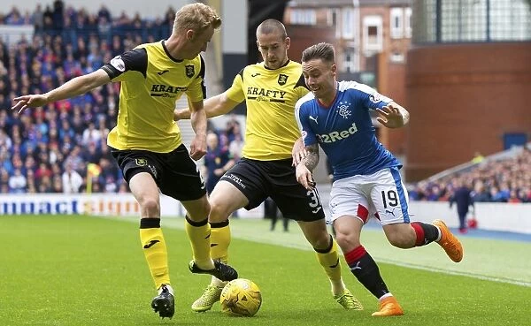 Intense Clash at Ibrox: Barrie McKay Squeezed Out in Rangers vs Livingston Ladbrokes Championship Match