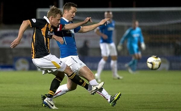Intense Clash: Rangers vs East Fife in Petrofac Training Cup Quarter-Finals at Bayview Stadium - Jon Daly vs Stevie Campbell