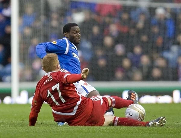 Intense Ibrox Showdown: Edu vs Fyvie - A Dramatic 1-1 Draw in Rangers vs Aberdeen's Scottish Premier League Clash