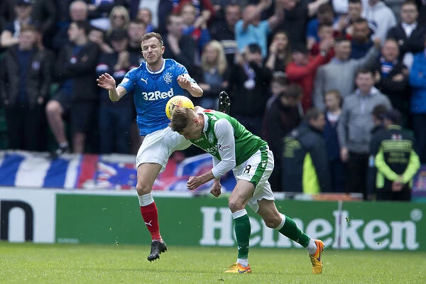 Intense Moment: Andy Halliday Tackles Vykintas Slivka in Rangers vs Hibernian Ladbrokes Premiership Clash