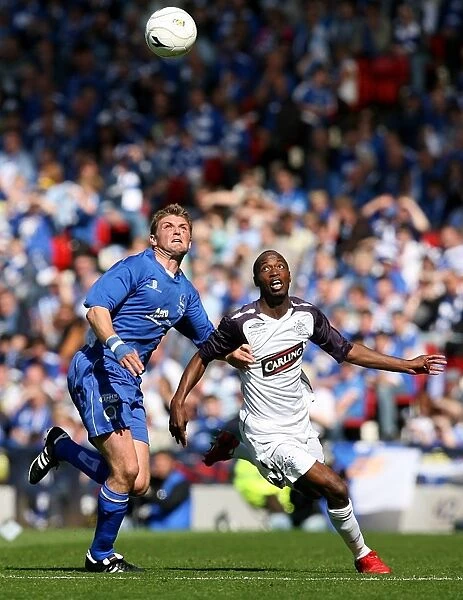 Intense Rivalry: Beasley vs McCann at the 2008 Scottish Cup Final - A Battle Between Rangers and Queen of the South