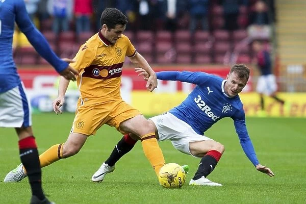 Intense Rivalry: Halliday vs. McHugh Clash in Motherwell vs. Rangers Betfred Cup Match