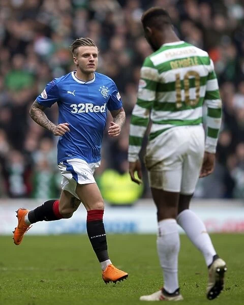 Intense Rivalry: Jason Cummings Fights for Victory at Ibrox Stadium - Scottish Premiership Clash Between Rangers and Celtic