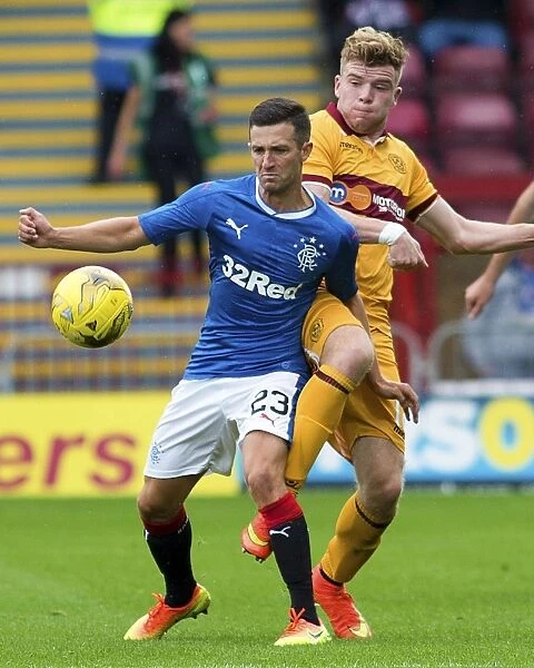 Intense Rivalry: Jason Holt's Battle for the Ball in the Betfred Cup Clash between Rangers and Motherwell