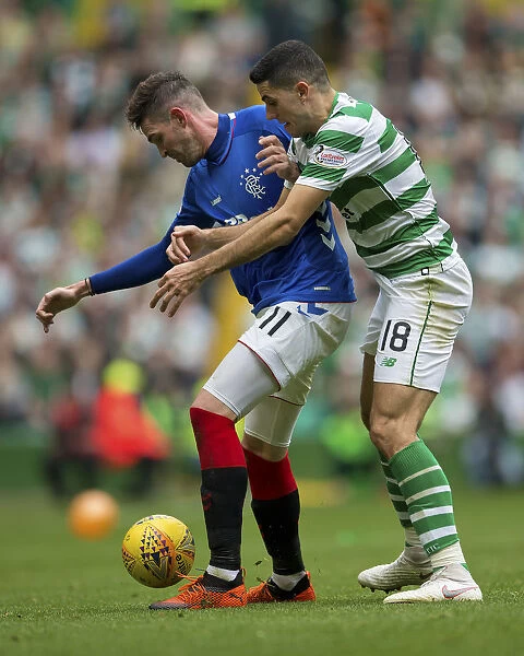 Intense Rivalry: Lafferty vs Rogic - Battle of the Titans in Rangers vs Celtic's Ladbrokes Premiership Clash at Celtic Park