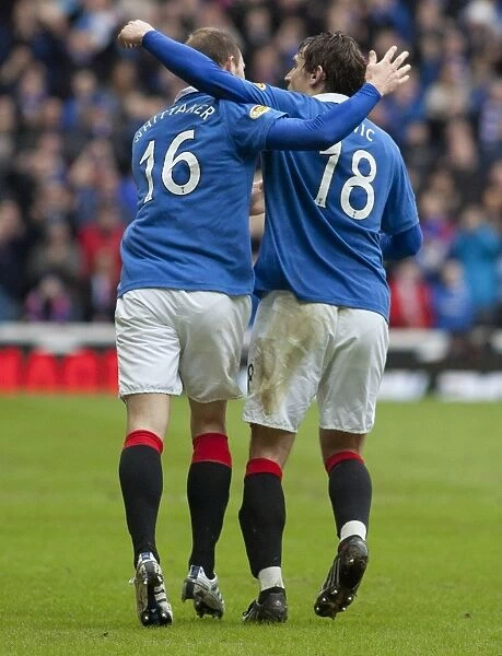 Jelavic and Whittaker's Penalty Goals: Intense Scottish Cup Clash between Rangers and Celtic at Ibrox (Round of 16)