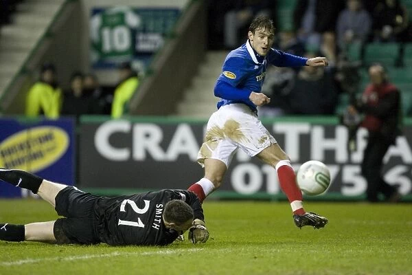 Jelavic's Stunning Scores Twice: Rangers Lead 2-0 Over Hibernian (Nikica Jelavic Rounded Graeme Smith for Second Goal)