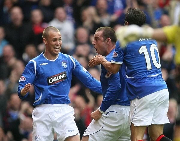 Jubilant Moment: Kris Boyd and Kenny Miller's Victory Dance after Rangers 2-1 Win over Kilmarnock at Ibrox