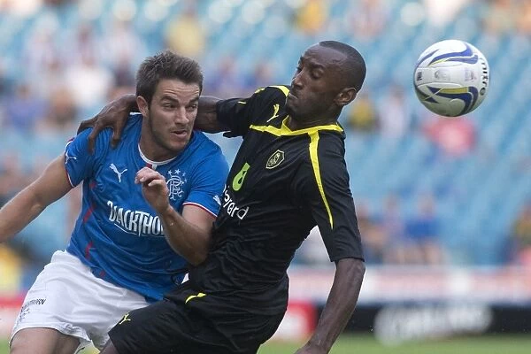 Kamil Zayatte Holds Off Rangers Attack: Sheffield Wednesday's 1-0 Lead (Pre-Season Friendly, Hillsborough Stadium)