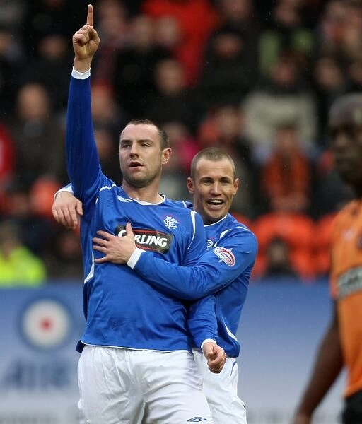 Kris Boyd's Double Strike and Epic Celebration: A Memorable Moment in Rangers vs. Dundee United (2-2), Clydesdale Bank Premier League
