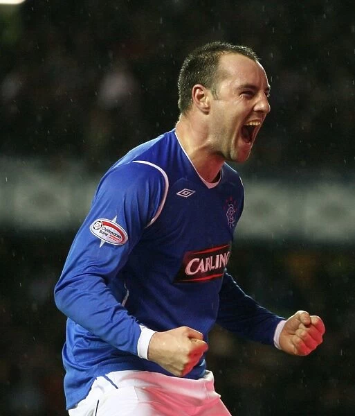 Kris Boyd's Double Strike: Rangers Triumphant 3-1 Victory over Falkirk in the Clydesdale Bank Premier League at Ibrox