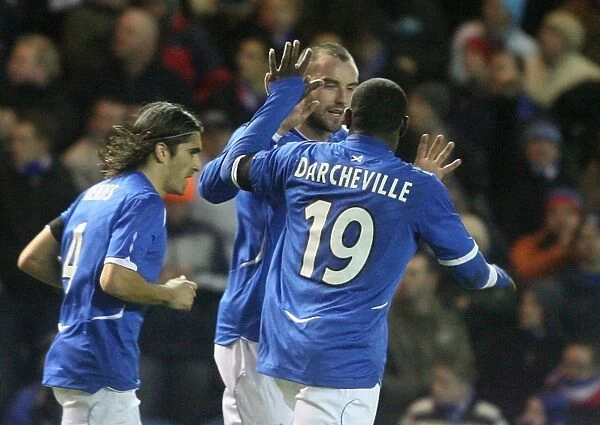Kris Boyd's Double Strike: Rangers Victory over Hamilton Academical (2-0) at Ibrox - Boyd Celebrates with Mendes and Darcheville