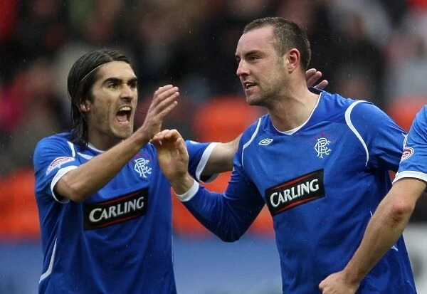 Kris Boyd's Double Strike: Thrilling 2-2 Draw between Dundee United and Rangers in the Clydesdale Bank Premier League