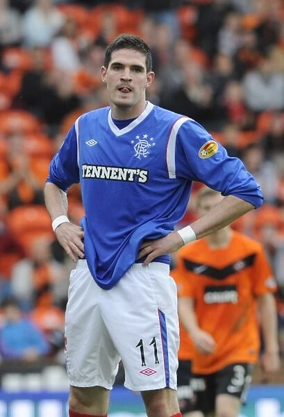 Kyle Lafferty's Game-Winning Goal: Rangers Conquer Dundee United in Scottish Premier League at Tannadice Stadium