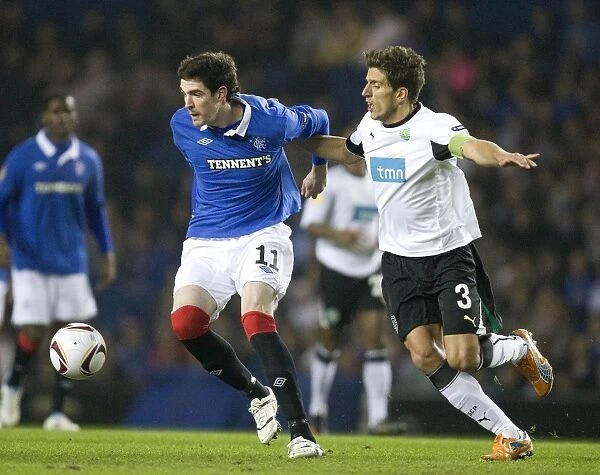 Lafferty vs. Carrico: A Thrilling UEFA Europa League Stalemate at Ibrox - Rangers 1-1 Sporting Lisbon