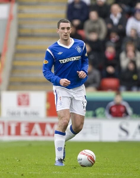 Lee Wallace Scores the Game-Winning Goal: Rangers Triumph at Pittodrie Stadium (1-2)