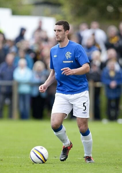 Lee Wallace's Game-Winning Goal: Rangers Advance in Scottish Cup against Forres Mechanics (0-1)