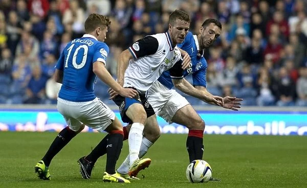 Macleod and Wallace in a Battle for the Ball: Intense Rivalry in the Scottish League Cup - Rangers vs Inverness Caledonian Thistle at Ibrox Stadium