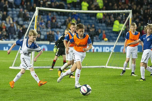 Magical Half-Time Show: Rangers U10 Entertain Ibrox Stadium Crowd during Betfred Cup Match against Ayr United