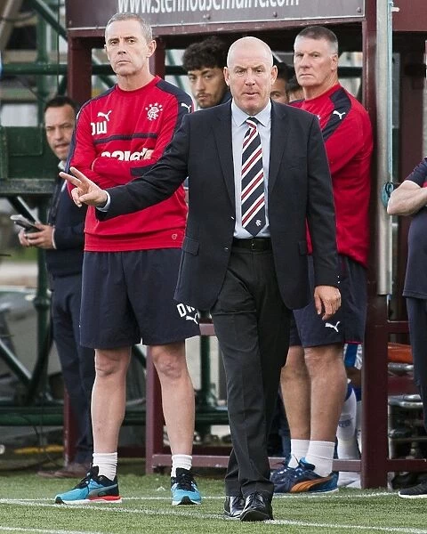 Mark Warburton Guides Rangers in Betfred Cup Match at Ochilview Park