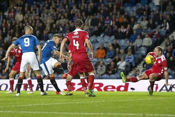Martyn Waghorn's Hat-trick: Rangers Triumph in Betfred Cup Quarterfinal vs Queen of the South at Ibrox Stadium