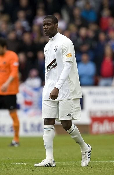 Maurice Edu's Game-Winning Goal: Rangers Triumph Over Dundee United in the Scottish Premier League at Tannadice Park (1-2)