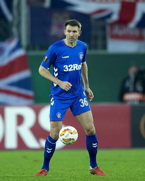 McAuley's Defiant Performance: Rangers vs Rapid Vienna in Europa League Group G at Allianz Stadion