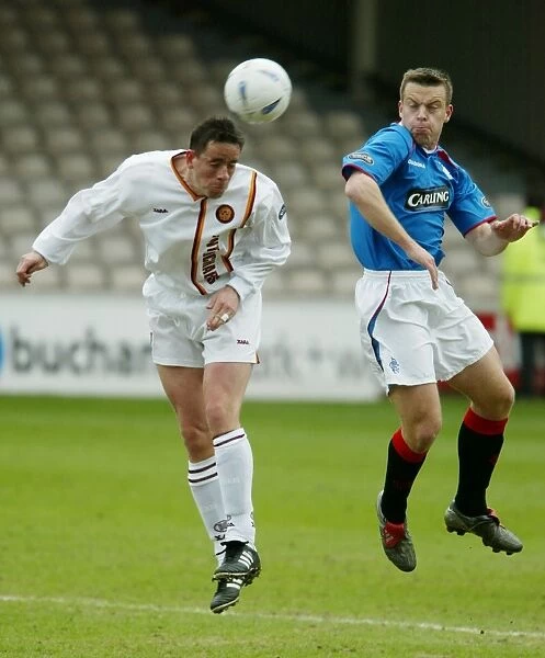 Moment of Triumph: Gavin Rae and Phil O'Donnell Secure Rangers Win Against Motherwell (04 / 04 / 04)