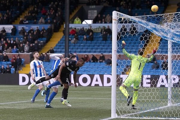 Morelos Misses: Rangers Forward Heads Over the Bar at Rugby Park Amidst Kilmarnock Rivalry