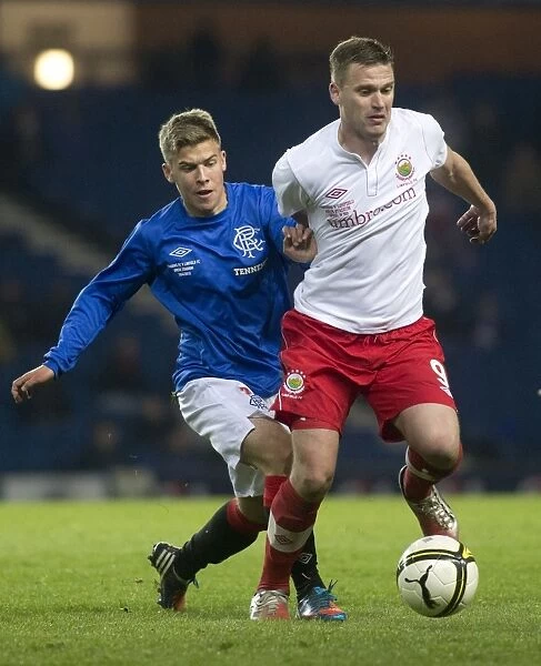 Murdoch and Thompson in Action: Rangers Lead 2-0 vs Linfield at Ibrox Stadium