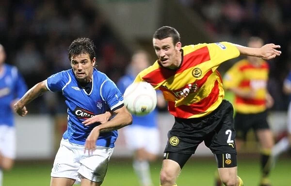 Nacho Novo's Brilliant Performance Leads Rangers to Co-op Insurance Cup Triumph over Partick Thistle (1-2)