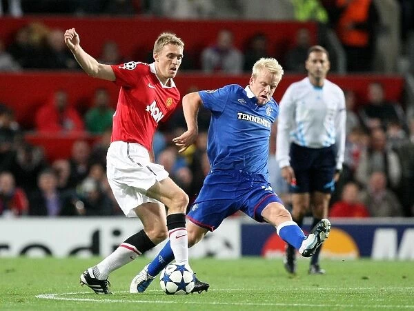 Naismith vs Fletcher: A Battle at Old Trafford - Rangers vs Manchester United in UEFA Champions League Group C (0-0)