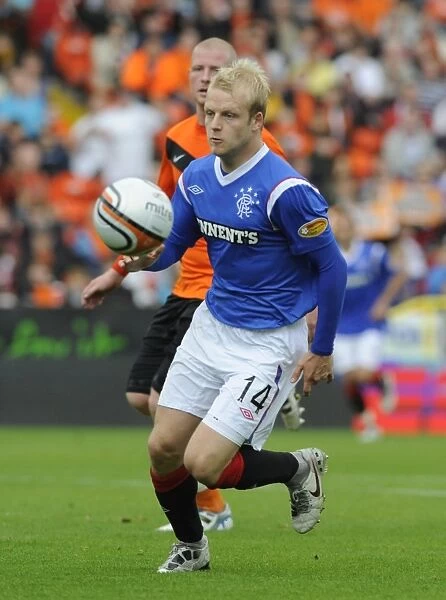 Naismith's Winning Goal: Rangers Conquer Dundee United in Scottish Premier League at Tannadice Stadium