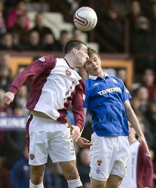 Ness vs Wallace: A Clash in the Clydesdale Bank Scottish Premier League - Heart of Midlothian Takes the Lead (1-0)