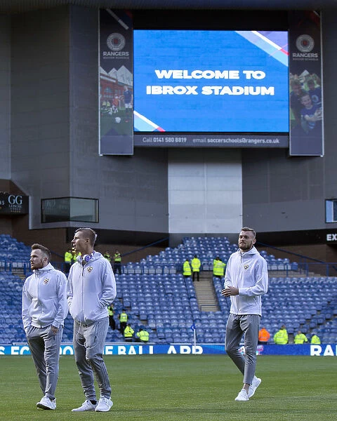 NK Maribor Players Examine Ibrox Stadium Pitch before Europa League Showdown against Rangers Football Club