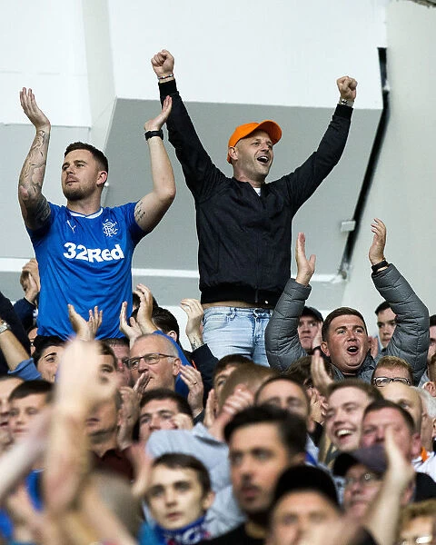 Passionate Rangers Fans Celebrate Europa League Clash at Ibrox Amidst Scottish Cup Triumph