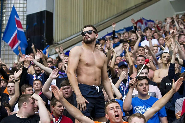 Passionate Rangers Fans Unleash Roar at Ibrox Stadium: A Sea of Pride and Tradition during Europa League Qualifier