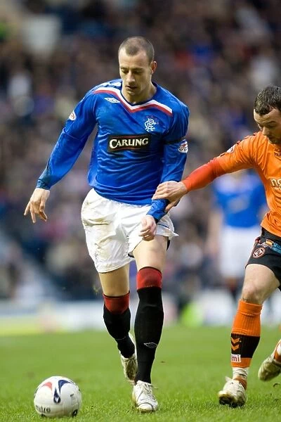 Rangers 2-0 Dundee United: Alan Hutton's Thrilling Ibrox Goal (Clydesdale Bank Scottish Premier League)