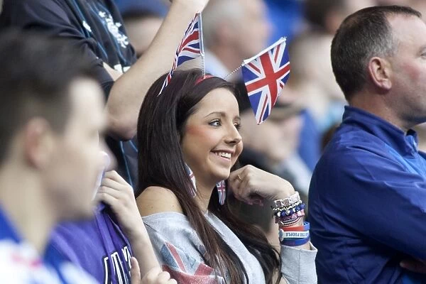 Rangers 2-0 Queens Park: Triumphant Moment in Ibrox Stadium's Blue Sea of Supporters