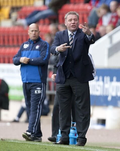 Rangers 4-0 Triumph Over St. Johnstone: Ally McCoist Celebrates with His Team