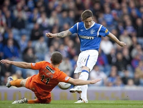 Rangers 5-0 Dundee United: A Clash of Midfield Titans - McCabe vs. Rankin at Ibrox