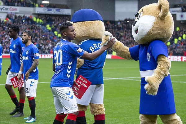 Rangers Alfredo Morelos Celebrates with Roxi after Securing Victory over Hearts at Ibrox Stadium (Scottish Premiership)
