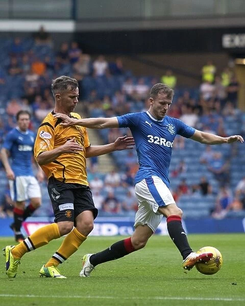Rangers Andy Halliday Protects Ball Amidst Betfred Cup Action at Ibrox Stadium